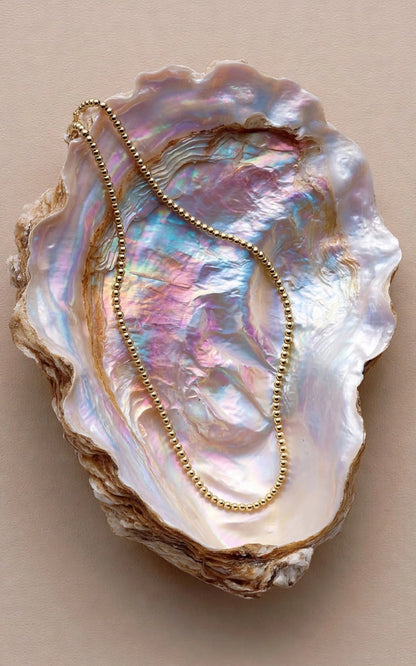 The Golden Bead Necklace