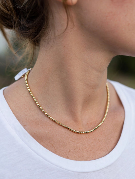 The Golden Bead Necklace